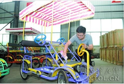 湖南湘潭大学生村官创立旅游自行车品牌
