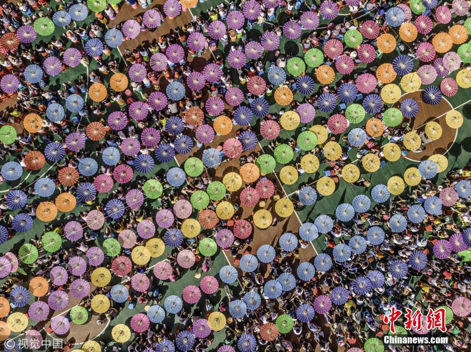 高温橙色预警下庆六一 广州学校挂1700把伞遮